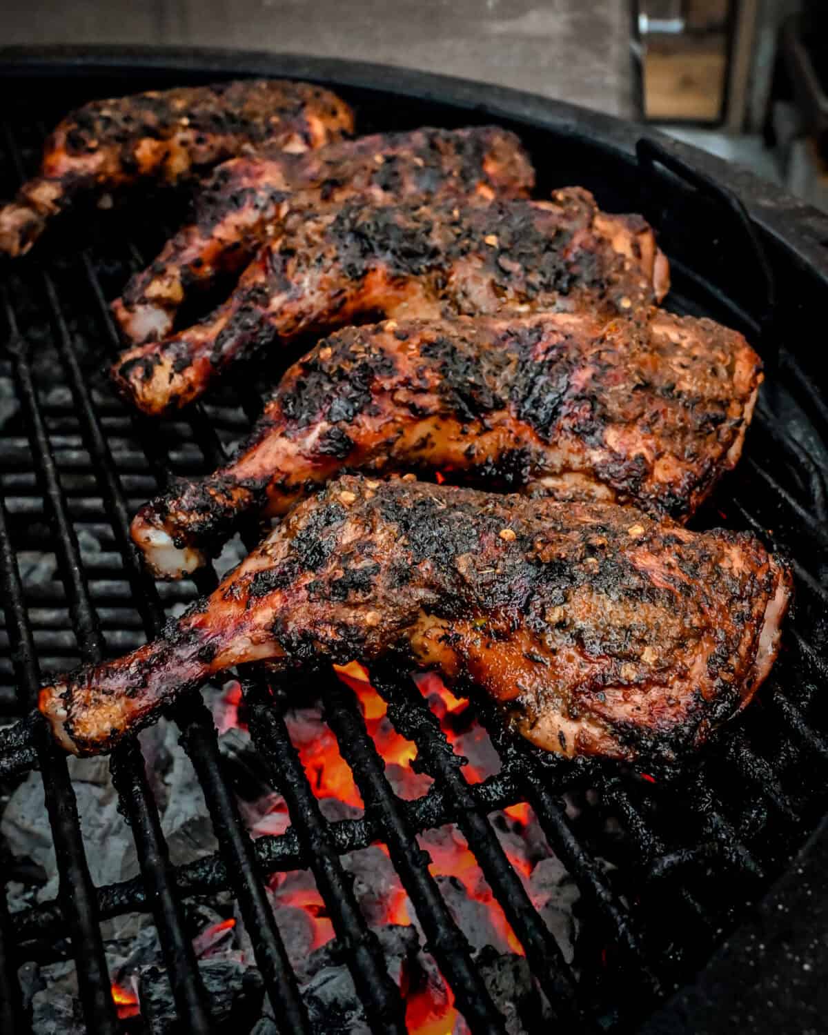 Authentic jerk chicken on charcoal grill